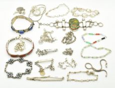 Nineteen silver bracelets including charm, sunstone, labradorite, jadeite, etc