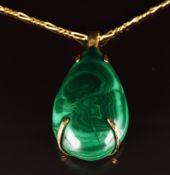 A 9ct gold pendant set with malachite on 9ct gold chain (40cm) with barrel clasp, 3.4g