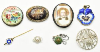 A silver brooch, Russian porcelain plaque, silver gilt pansy pendant/ miniature mirror,