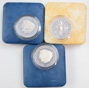 Royal Mint three silver proof Royal Commemorative crowns to include Royal Wedding and Queen Mother's