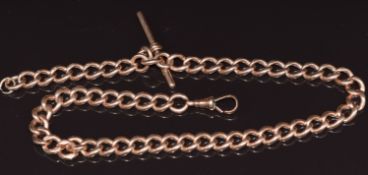 A 9ct rose gold Albert / watch chain made up of curbed links, 36cm, 59.8g