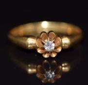 An 18ct gold ring set with a diamond, 3g, size P
