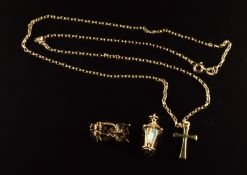 A 9ct gold chain, 9ct gold cross, 9ct gold and crystal charm and a 9ct gold brooch in the form of an