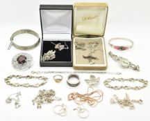 A collection of silver jewellery including bangle, ring, five chains, six bracelets, watch, etc