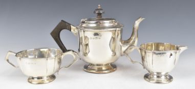 George V hallmarked silver three piece bachelor's teaset with Arts and Crafts or Art Nouveau