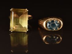 An 18ct gold ring set with topaz (5g) and a 9ct gold ring set with quartz, 6g, size K