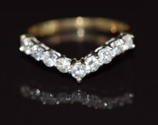 A 9ct gold V shaped ring set with diamonds, 1.6g, size L