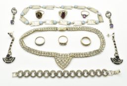 A silver necklace set with lace agate cabochons, a 9ct gold eternity ring (3.6g), silver ring, two