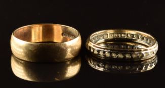 A 9ct gold wedding band / ring and a 9ct gold eternity ring set with spinel, 5.3g, size P