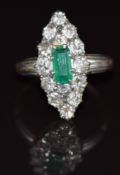 Victorian 18ct gold ring set with an emerald cut emerald surrounded by old cut diamonds, 5.5g,