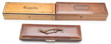 Three Edwardian glove boxes comprising inlaid oak and rosewood, satinwood and concertina action