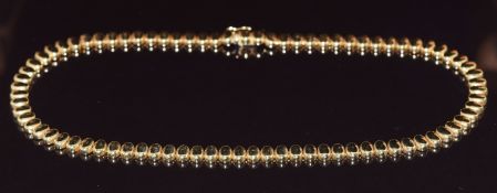A 14k gold necklace made up of oval links, 41cm, 30g