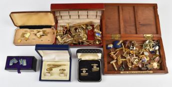 A collection of studs and cufflinks