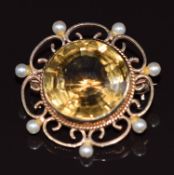 A 9ct gold brooch set with a round cut citrine and pearls, 7.1g