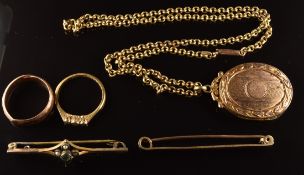 An 18ct gold ring set with three diamonds in a platinum setting (1.5g), 9ct rose gold ring (0.9g),