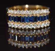 An 18k gold ring set with baguette cut sapphires and diamonds, 8.3g, size N