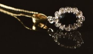 A 9ct gold pendant set with a sapphire and diamonds, on 9ct gold chain, 1.5g