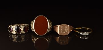 A 9ct rose gold signet ring (Birmingham 1924, 4.4g), an 18ct gold ring set with diamonds in a