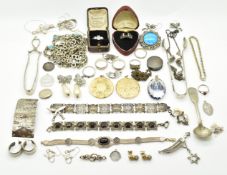 A collection of silver jewellery including nine rings, bracelets, necklaces, brooches, silver