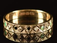 A 9ct gold ring set with diamonds and emeralds (two stones missing), 2.1g, size P