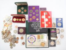 A collection of coin sets, Channel Islands, Falkland Liberation crown etc together with further