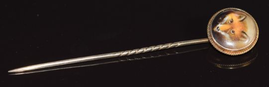 Victorian stick pin set with a painted enamel plaque depicting a fox, within a rope twist border, by