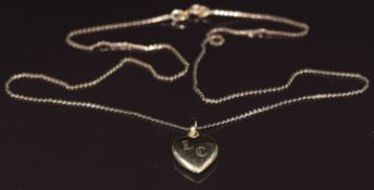 A 14k gold heart pendant (1.4g) on 9ct gold chain, 2.1g
