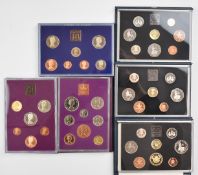 Royal Mint United Kingdom proof coin sets in deluxe cases 1984-1986 together with three sets in