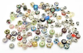 A collection of silver Pandora style charms
