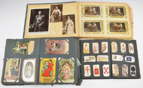 Approximately 250 postcards in two Edwardian albums dated to cover of one 1911, including