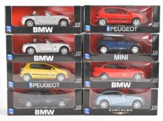 Eight NewRay 1:32 scale diecast model cars to include BMW Z4, Peugeot 307, Chrysler Crossfire and