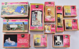 Eleven boxed Sindy furniture sets together with a selection of loose accessories.