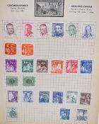 A GB and world mint and used stamp collection in four albums from early issues to Queen Elizabeth