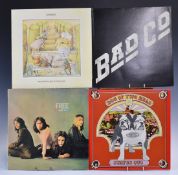 A collection of albums comprising Free (8), Bad Company (6), Genesis (7), Status Quo (12),