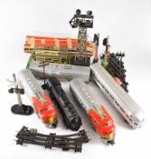 Lionel 0 gauge electric model railway items comprising 4-8-4 Steam Locomotive, Santa Fé diesel