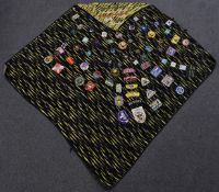 Scouting interest blanket with applied patches, including many African examples