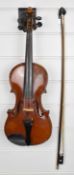 Mid 20thC ¾ size two piece back violin, length of back 33.5cm, with bow and hard case