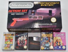 Nintendo retro gaming entertainment system, NES version action set in original box with games