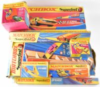 A collection of Matchbox Superfast track and accessories to include Le Mans Power Booster Set, SF-6,