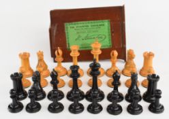 The Staunton Chess-Men boxwood and ebony chess set, height of King 7cm, in wooden box.