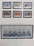 A large mostly modern mint New Zealand stamp collection in six Stanley Gibbons albums and five