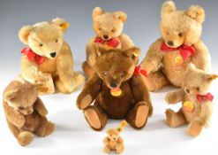 Seven Steiff Teddy bears including Original examples, largest 38cm tall, most with original tags.