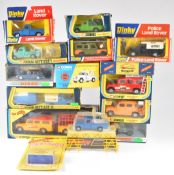 Fifteen Corgi and Dinky diecast model Land Rovers including Gift Set 7 Daktari, Land Rover 15 with
