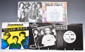 Approximately 200 singles, mostly 1980s