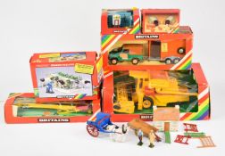 A collection of Britains diecast model farm vehicles and figures, most in original boxes.