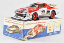 Taiyo (Japan) Lancia Stratos GR.5 tinplate battery operated car, with red and white body and