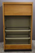 Gordon Russell of Broadway light oak tambour fronted cupboard, with metal linings for adjustable