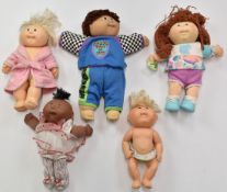 Five 1980' & 90's Cabbage Patch dolls, largest 40cm tall.