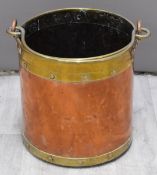 Brass bound and riveted copper bucket, height including handle 51cm