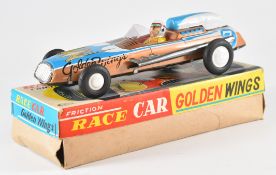 Golden Wings Japanese tinplate friction race car in original box.